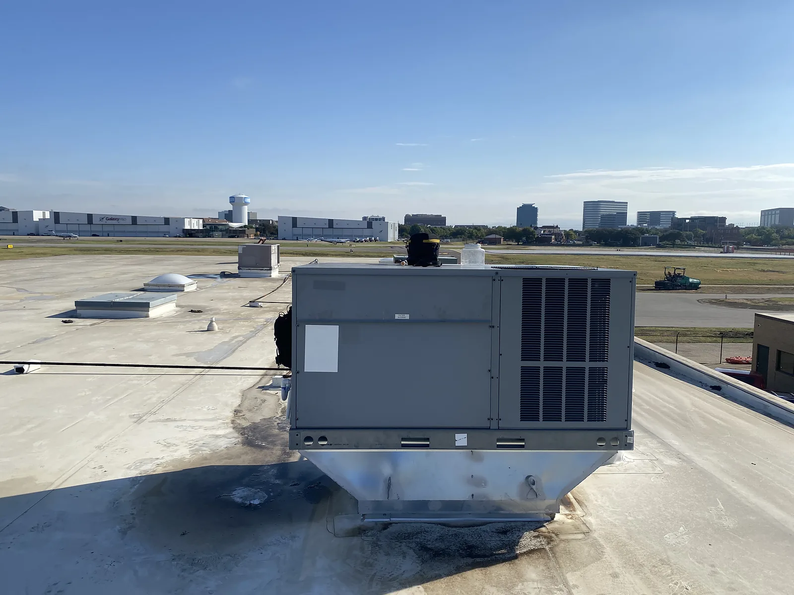 Commercial rooftop HVAC unit serviced by Too Cool Air.