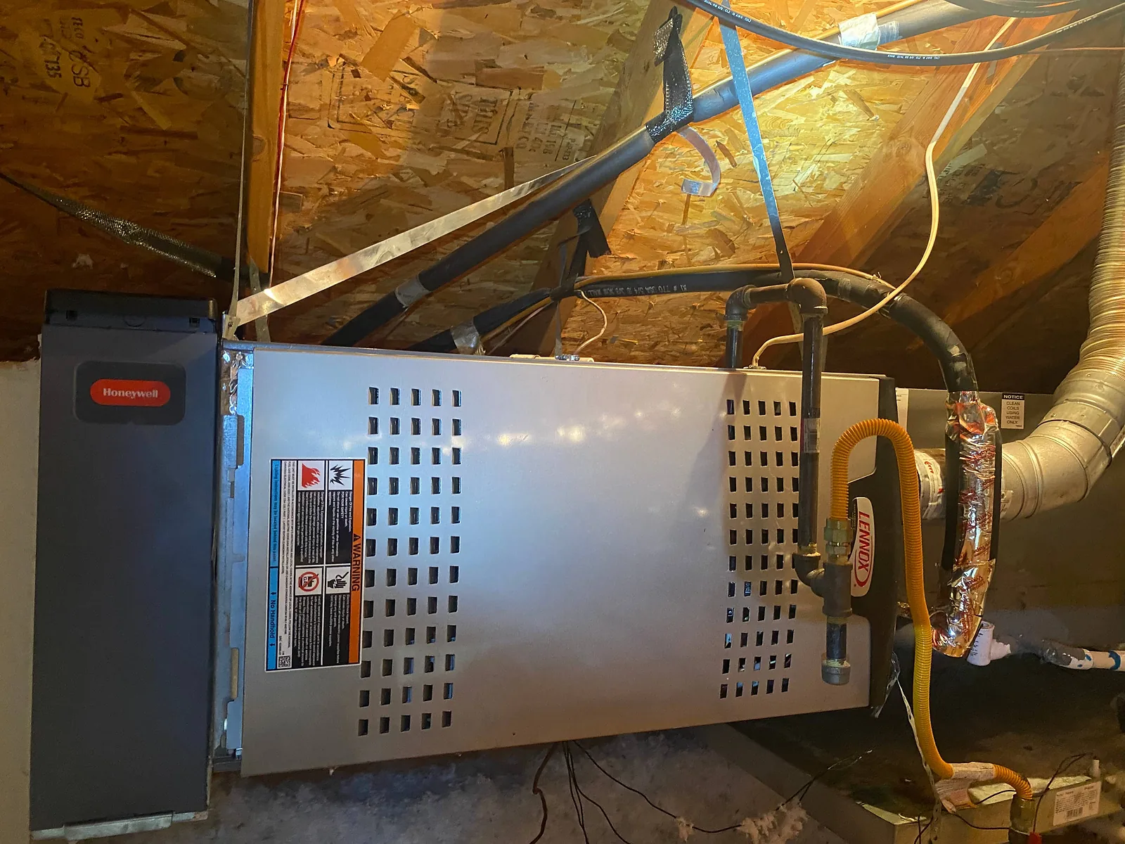 Gas furnace installed horizontally in a North Texas attic.